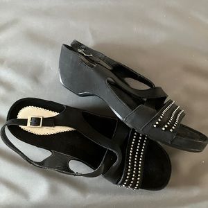 Black wedge sandals with rhinestones.